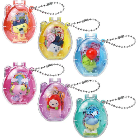 Set of colorful keychains with cartoon characters in transparent cases on a white background